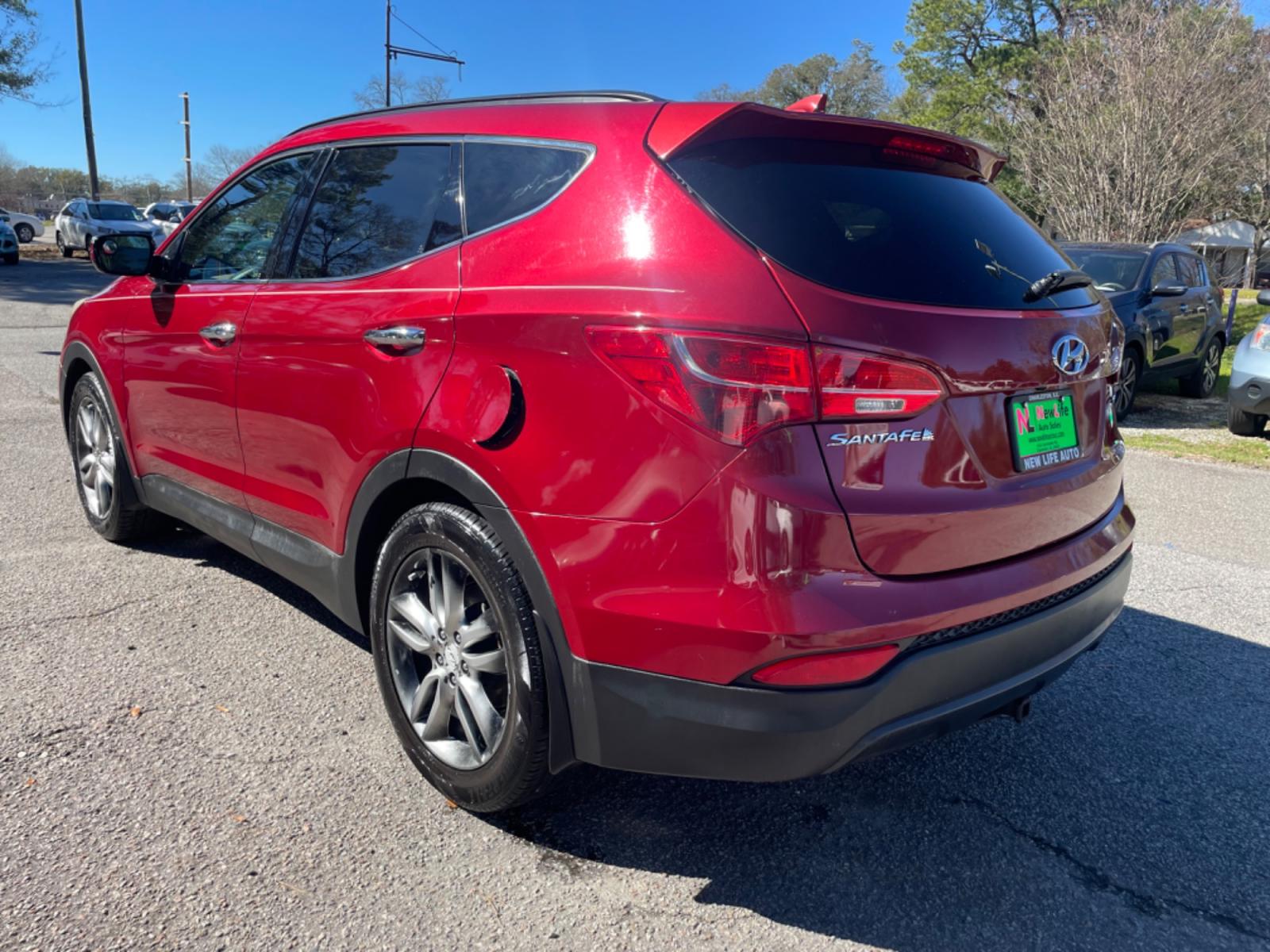 2013 RED HYUNDAI SANTA FE SPORT 2.0T (5XYZU3LA3DG) with an 2.0L engine, Automatic transmission, located at 5103 Dorchester Rd., Charleston, SC, 29418-5607, (843) 767-1122, 36.245171, -115.228050 - Leather, CD/AUX/Sat/Bluetooth, Dual Climate, Power Everything (windows, locks, seats, mirrors), Heated Seats, Rear Heated Seats, Push Button Start, Keyless Entry, Alloy Wheels. Local Trade-in!! Located at New Life Auto Sales! 2023 WINNER for Post & Courier's Charleston's Choice Pre-owned Car Dealer - Photo #4